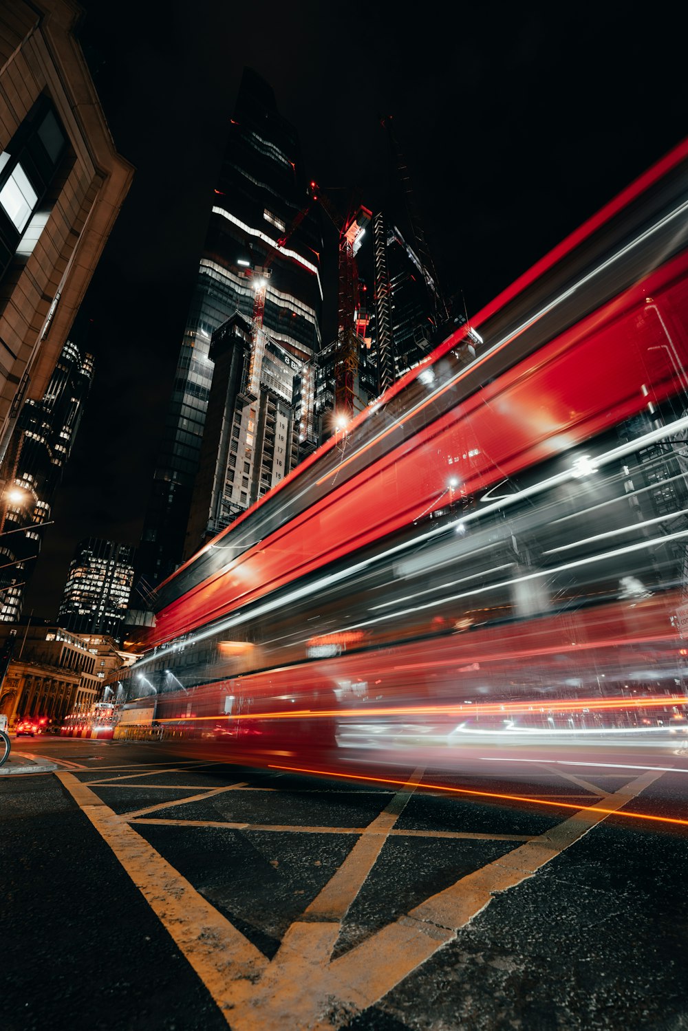 a blurry photo of a city street at night