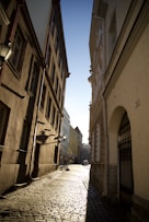 a cobblestone street in a european city