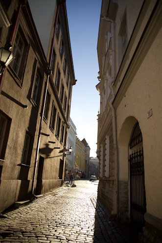 a cobblestone street in a european city