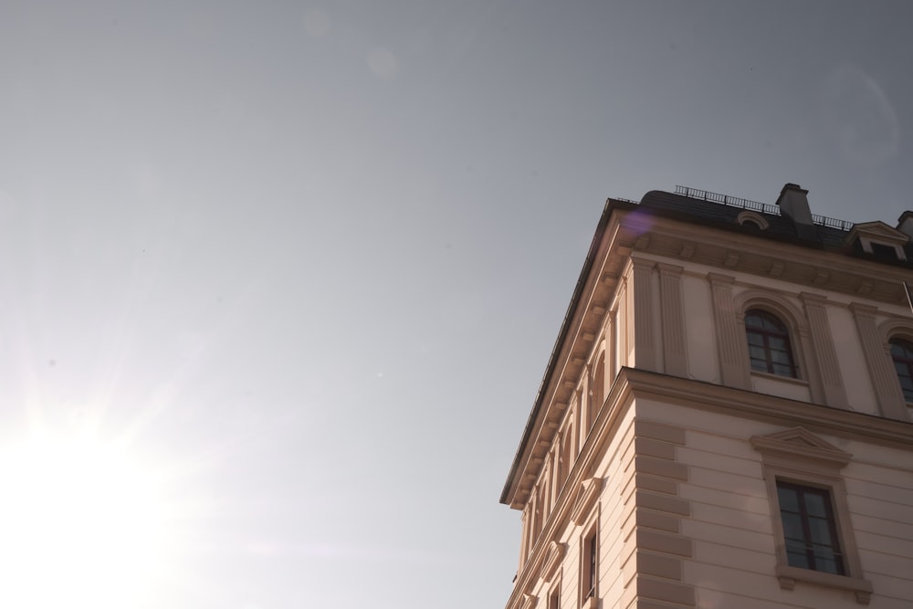 a tall building with a clock on the top of it