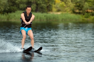 a man is water skiing on a lake