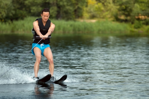 a man is water skiing on a lake