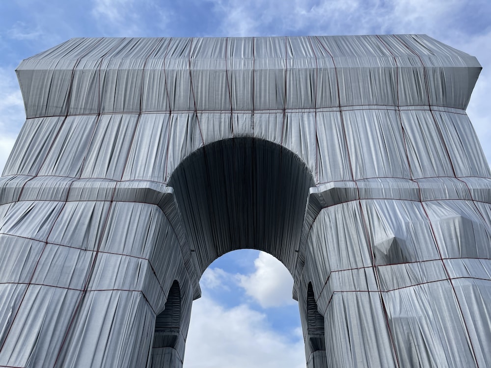 a very tall structure with a sky in the background