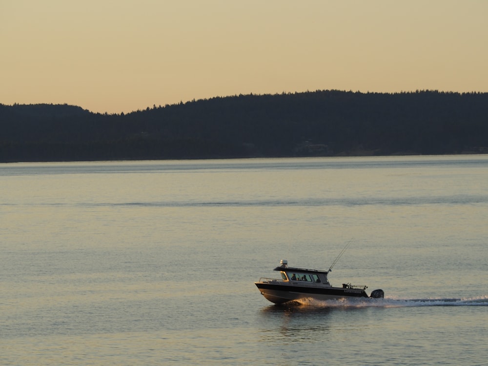 a boat traveling across a large body of water