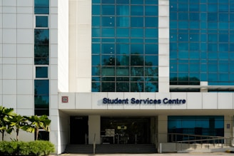 a building with a sign that says student service centre