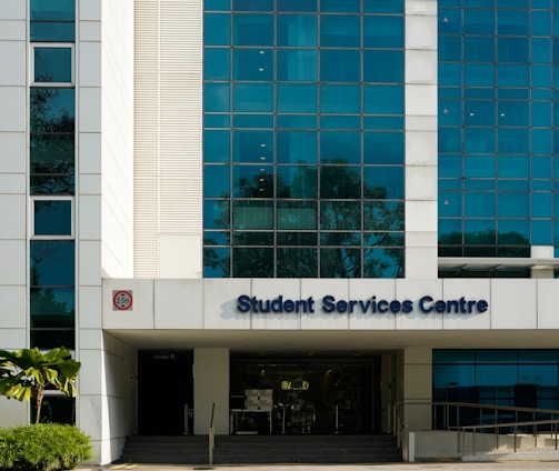 a building with a sign that says student service centre