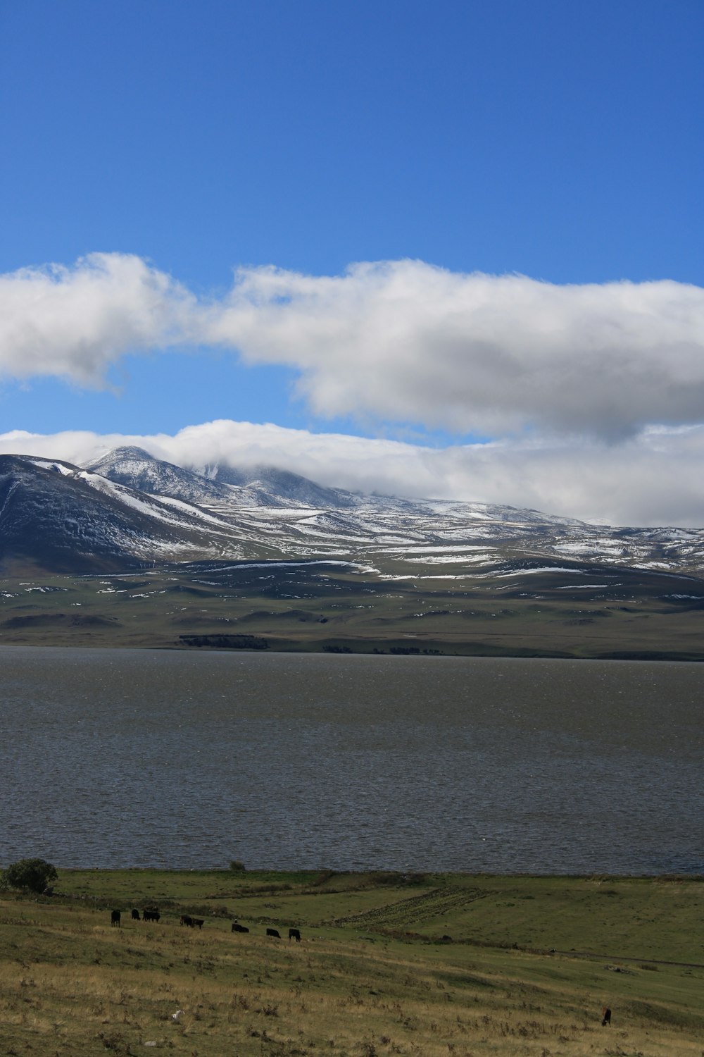 a large body of water surrounded by mountains