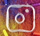 a picture of some yarn and a pair of scissors