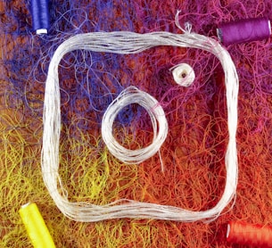 a picture of some yarn and a pair of scissors