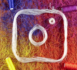a picture of some yarn and a pair of scissors