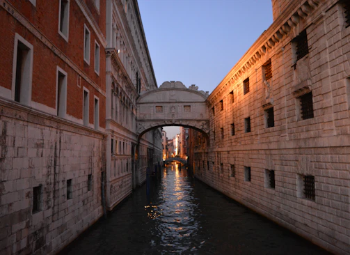 a canal with a bridge going under it