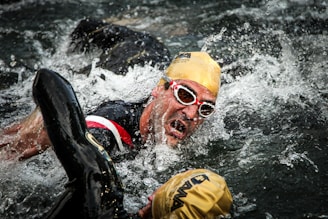 a man is swimming in a body of water