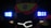 The image displays the front of a vehicle or bike adorned with bright LED lights. Blue and orange lights are prominent next to a central logo or emblem which features a red star and text. The lighting creates a high-contrast effect against the dark background.