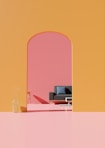a living room with a couch and a vase