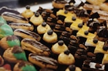 a close up of a tray of cookies and pastries
