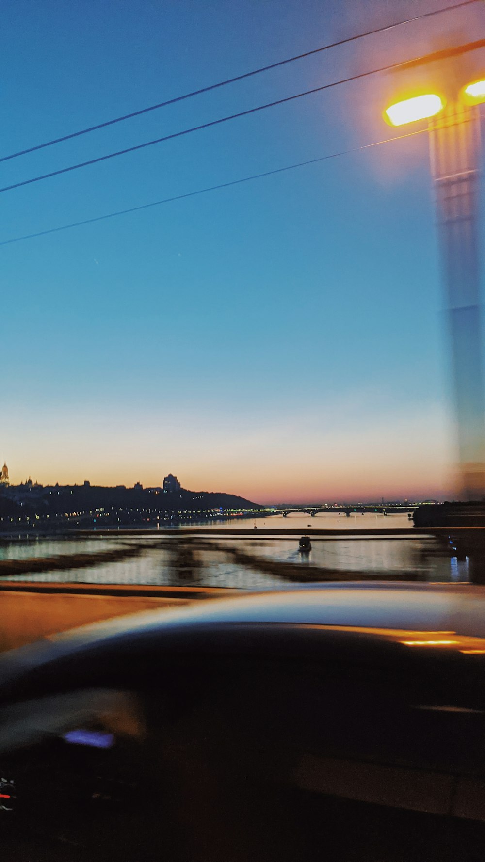 a view of a city from a moving car