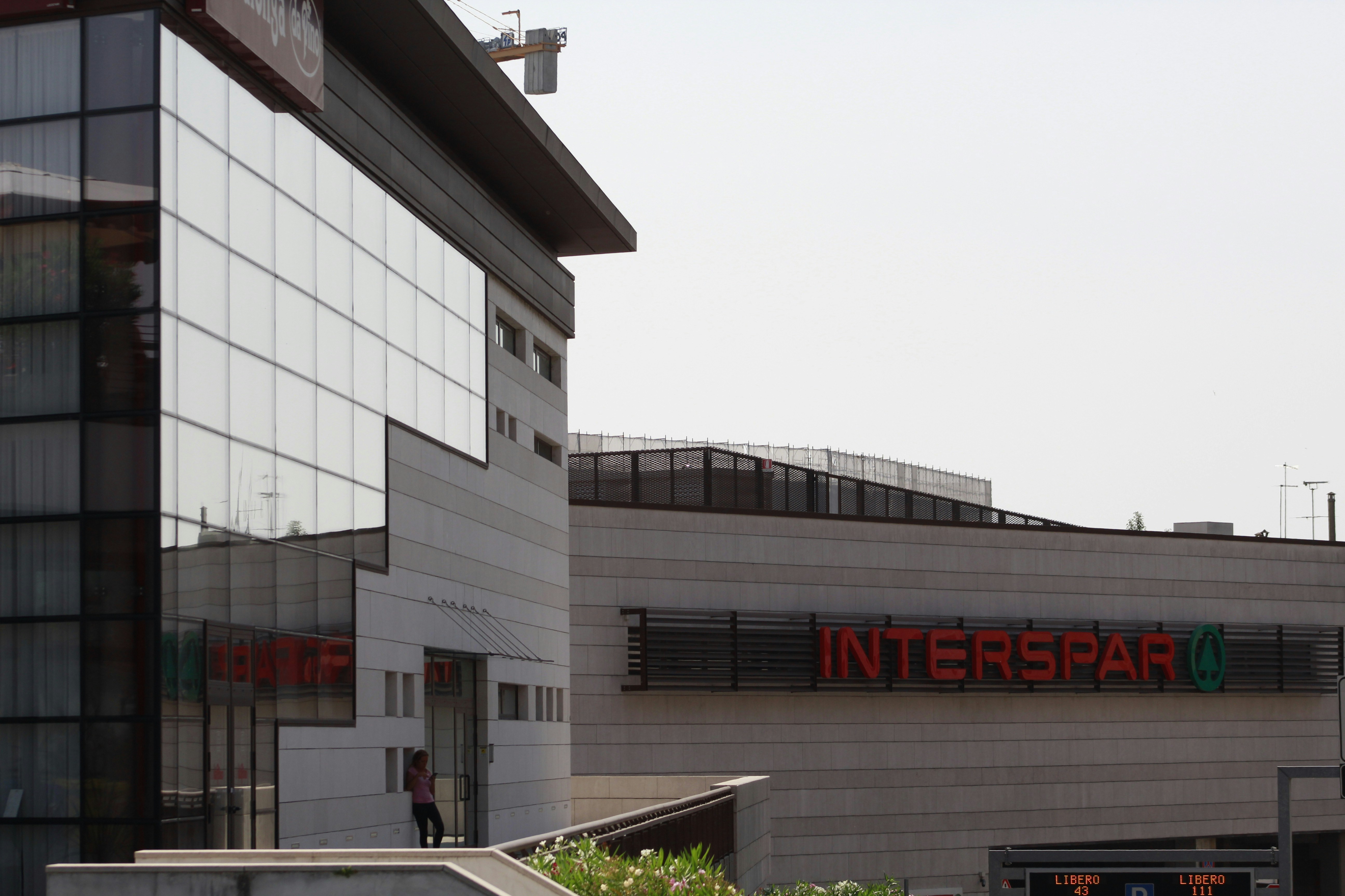 a building with a sign that says interspar on it