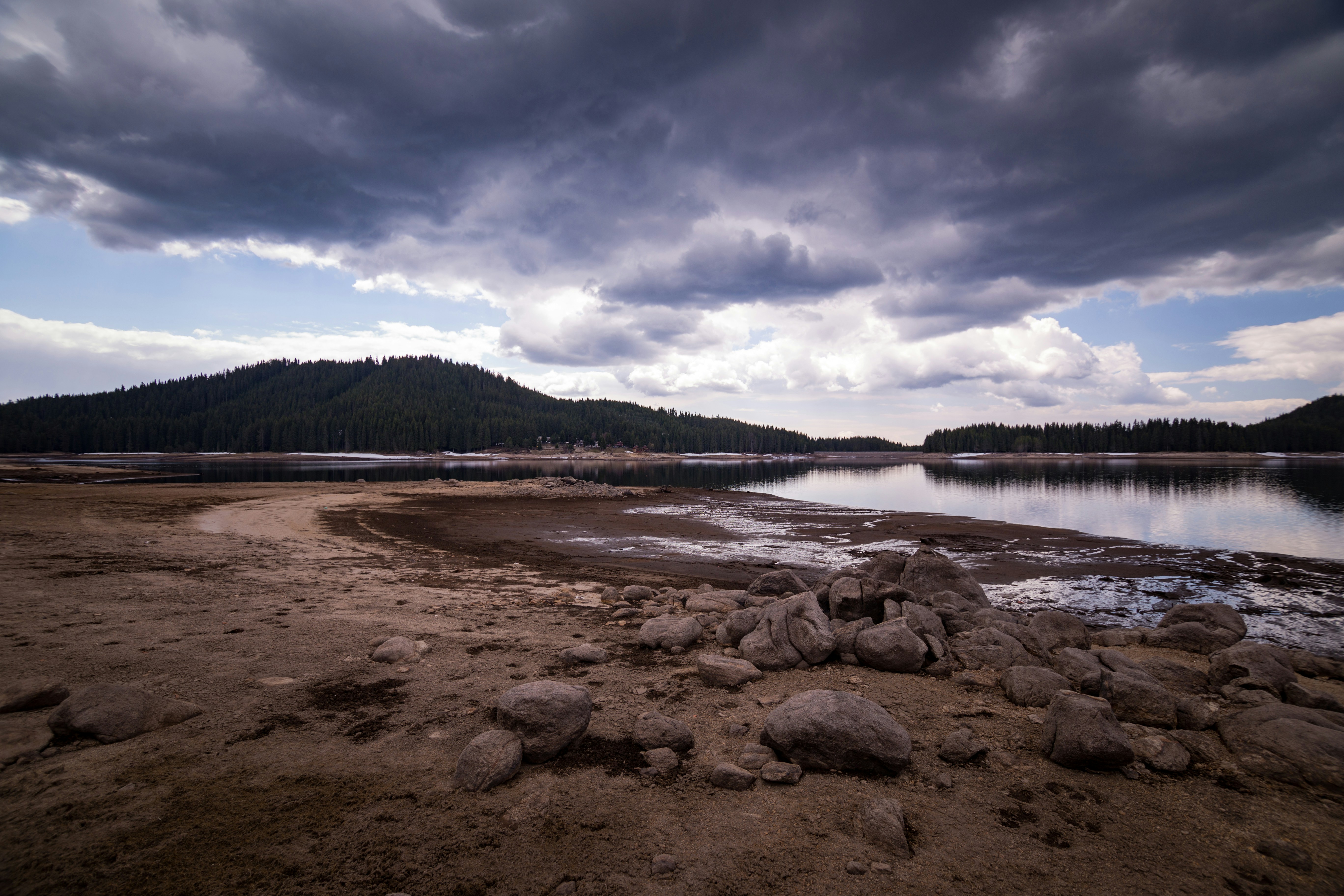 dry cracked reservoir low water level