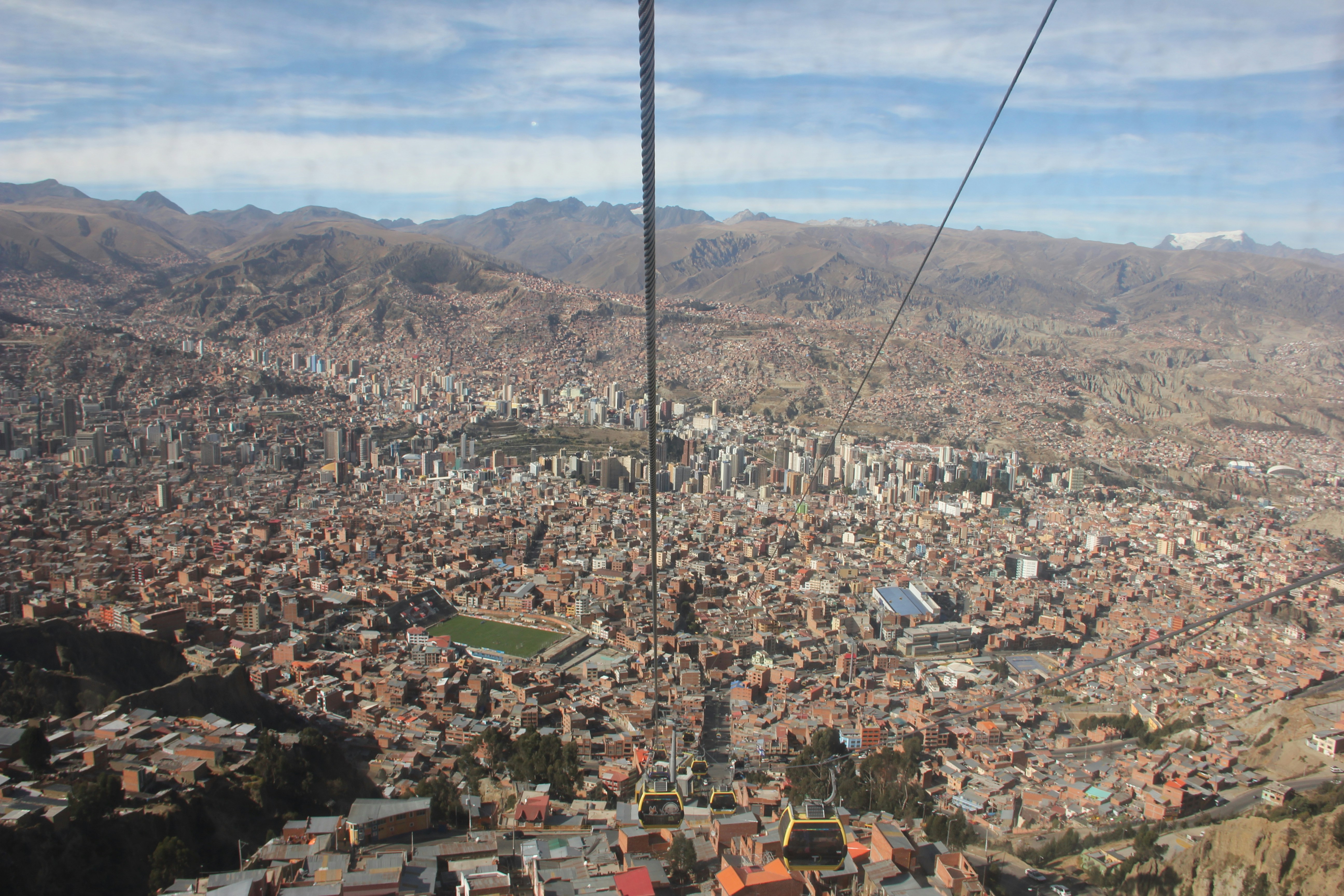 a view of a city from a cable car