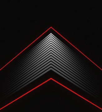 a dark room with a red light at the top of it