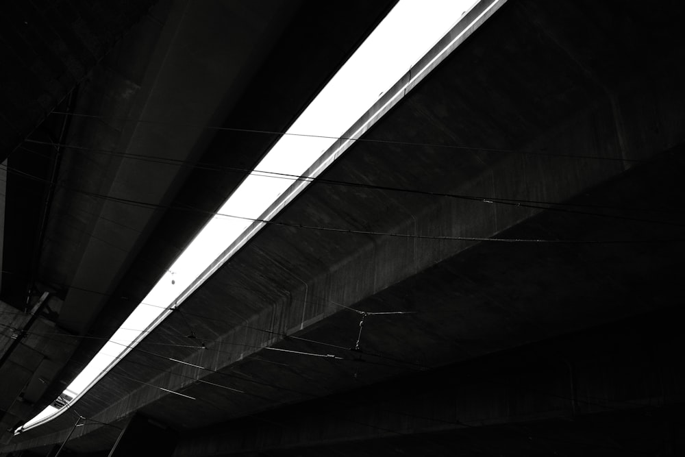 a black and white photo of a bridge