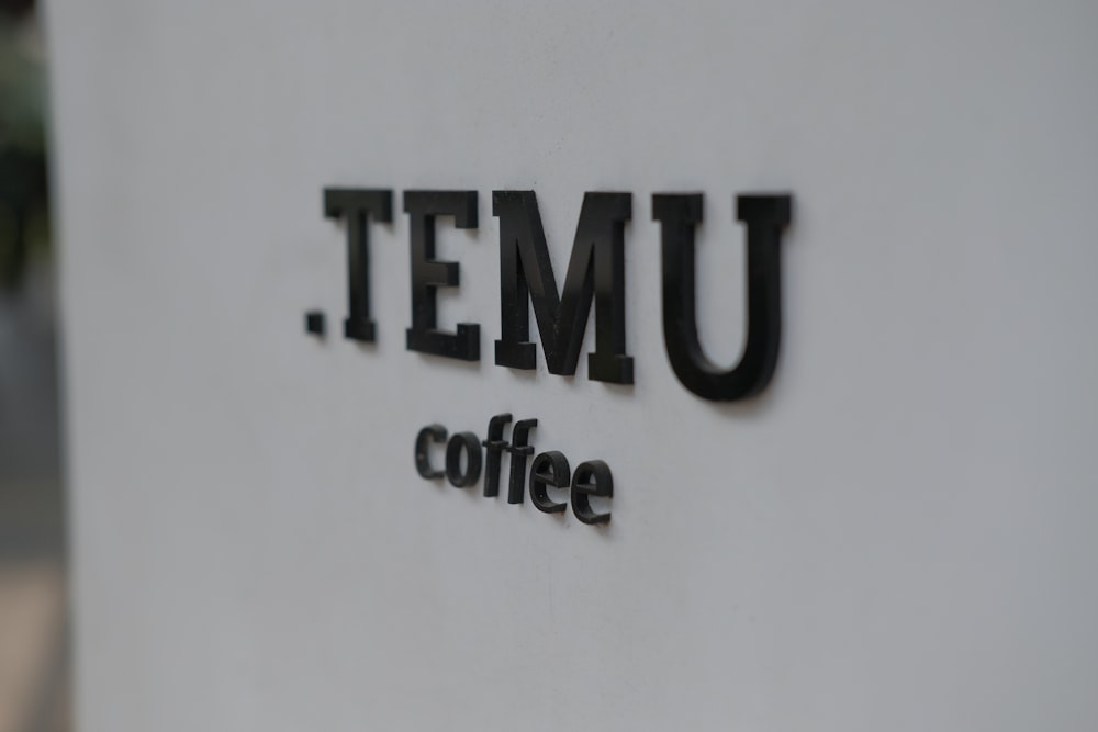 a sign that says temu coffee on it