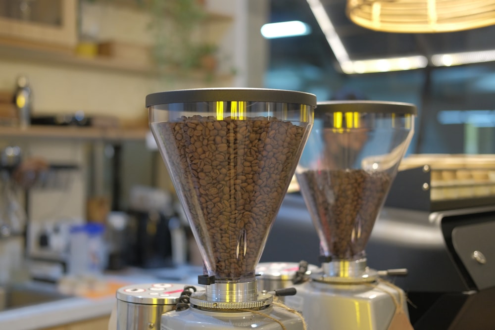 a coffee grinder sitting on top of a counter