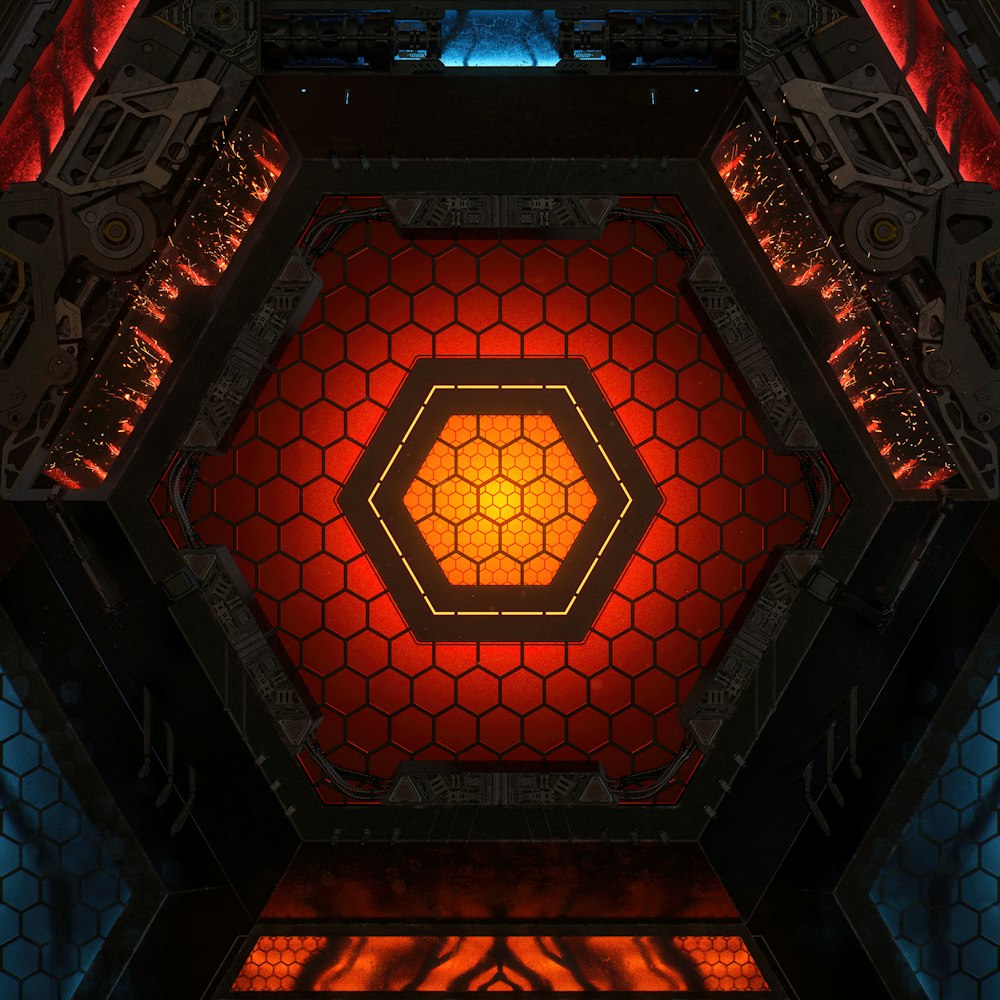 a red and yellow hexagonal structure with lights