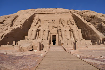 The temple facade of Abu Simbel in the desert