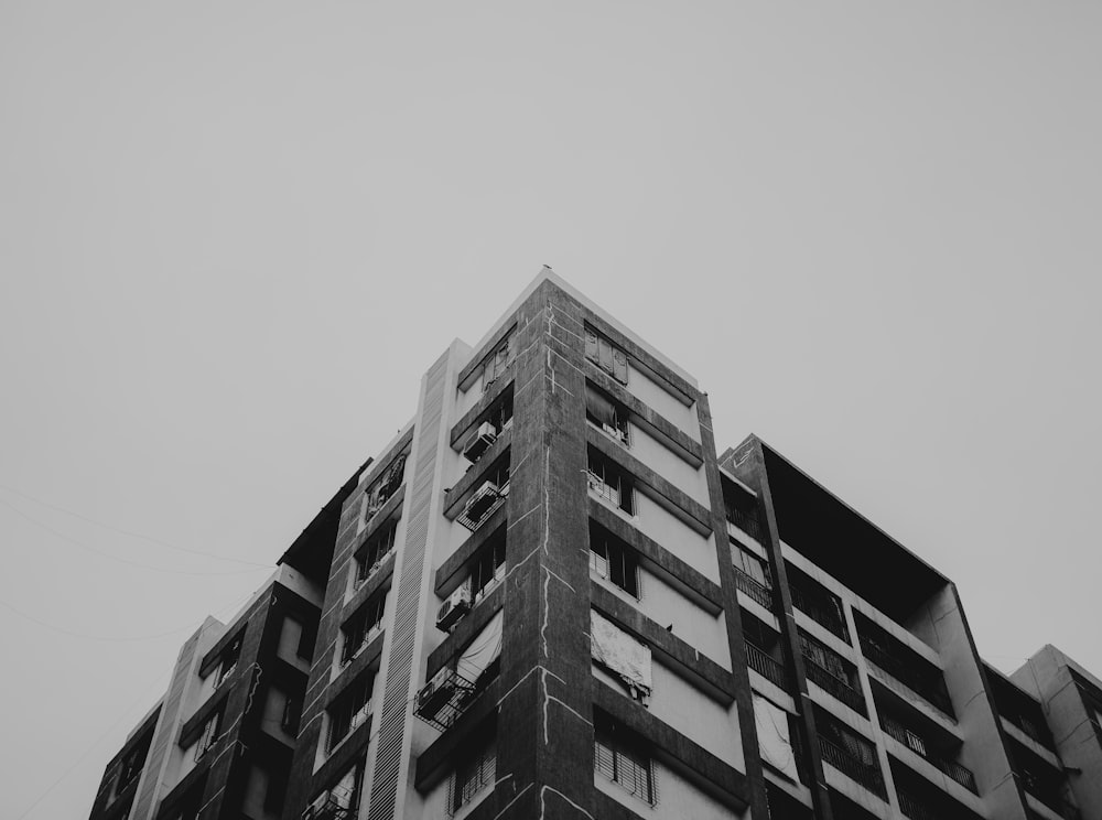 a black and white photo of a tall building