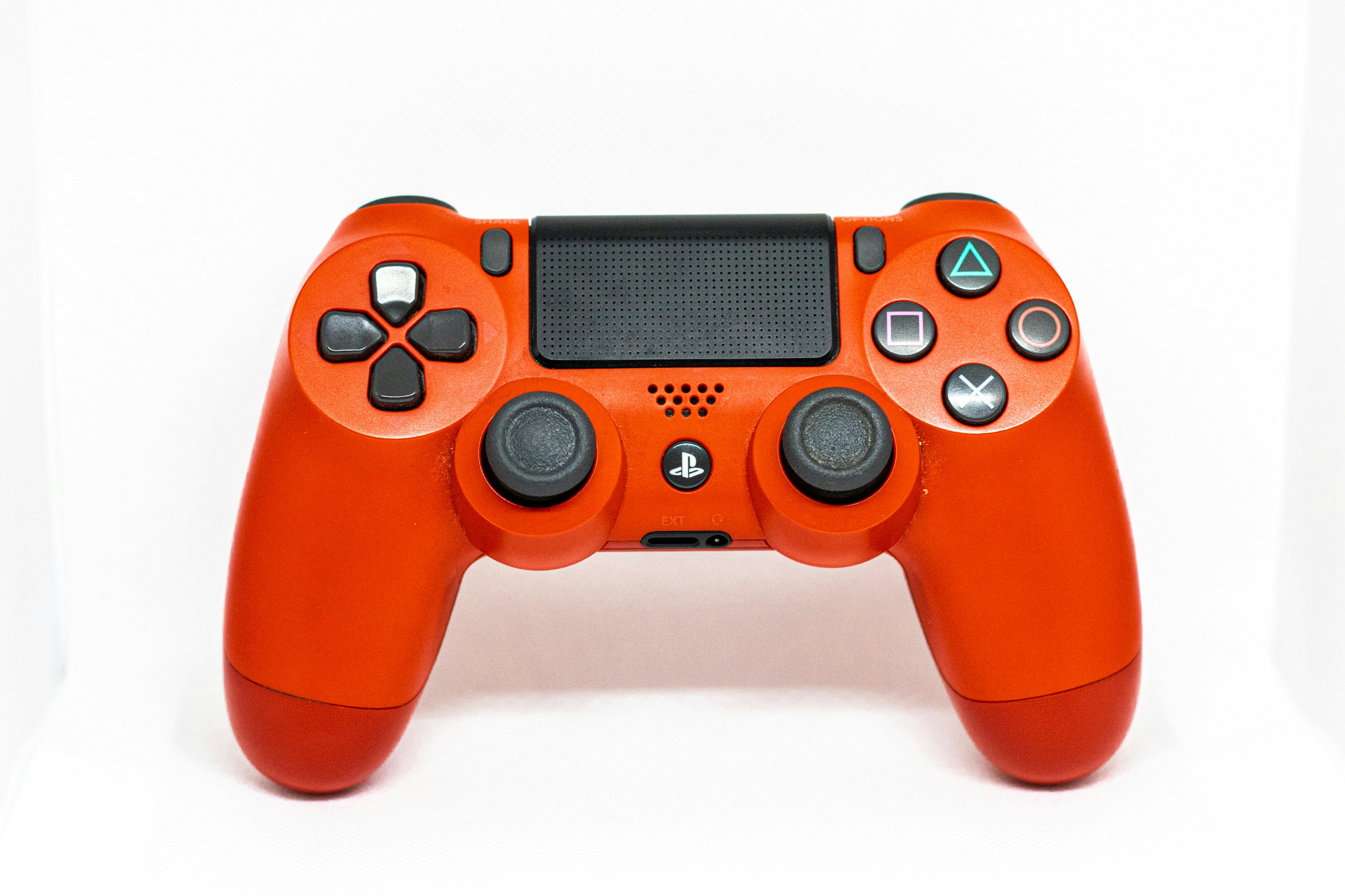 A close up of a video game controller photo – Free Games Image on Unsplash