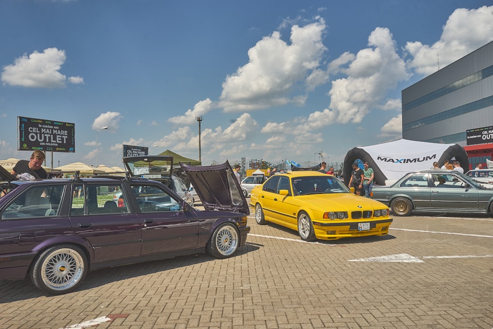 a couple of cars parked in a parking lot