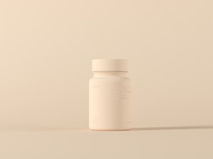 a bottle of medicine sitting on top of a table
