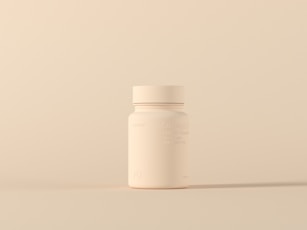 a bottle of medicine sitting on top of a table