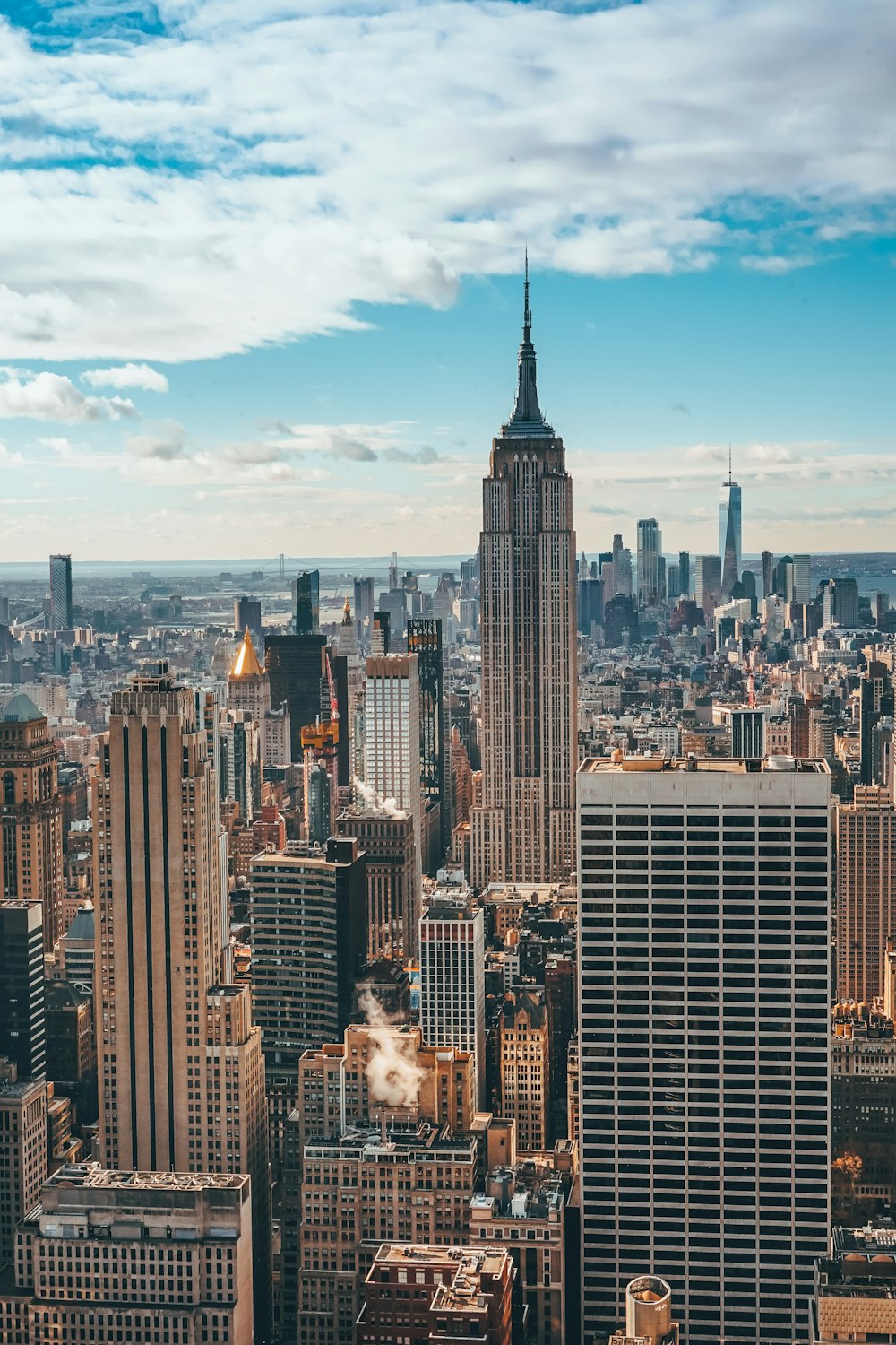 a view of a large city with tall buildings