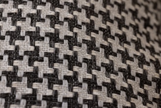 a close up of a black and white checkered fabric