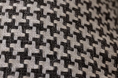 a close up of a black and white checkered fabric