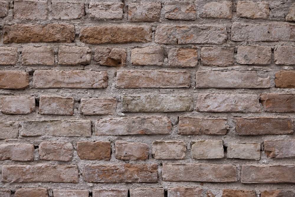 a close up of a brick wall made of bricks