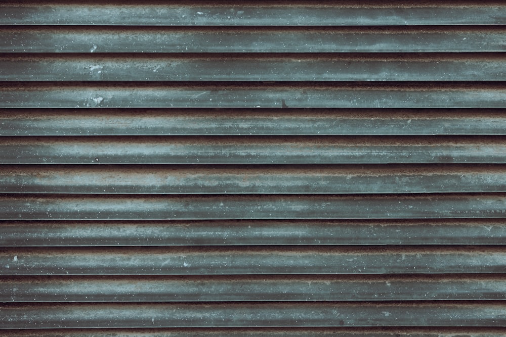 a close up of a metal surface with a lot of rust