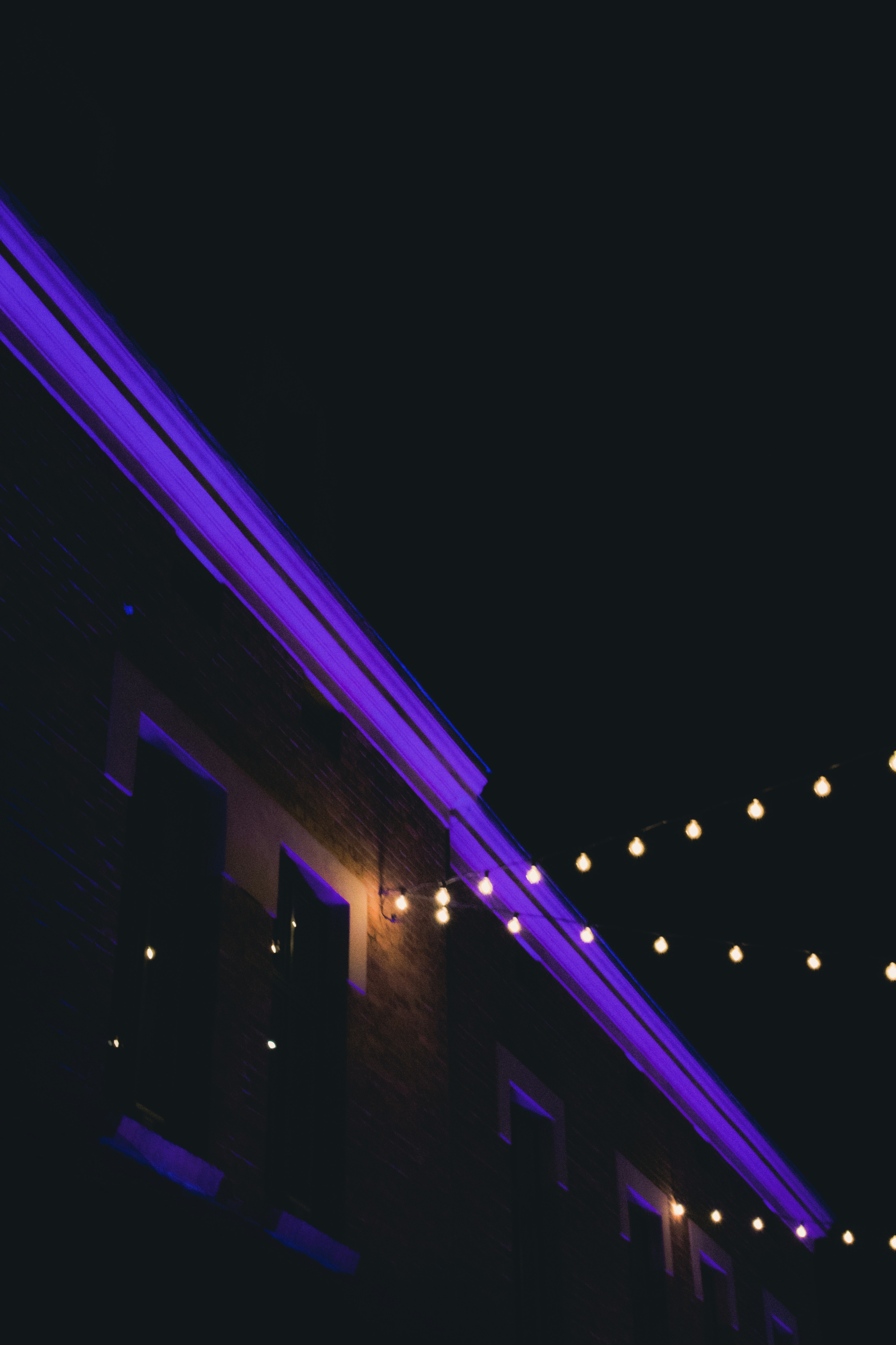 a building that has some lights on it