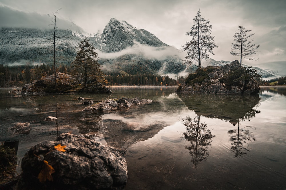 a lake with a mountain in the background