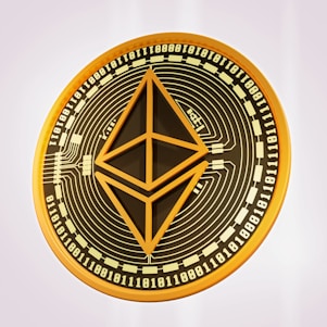 A digital representation of an Ethereum coin featuring a network-like pattern and binary code surrounding the Ethereum logo in the center. The coin has a gold and black color scheme.