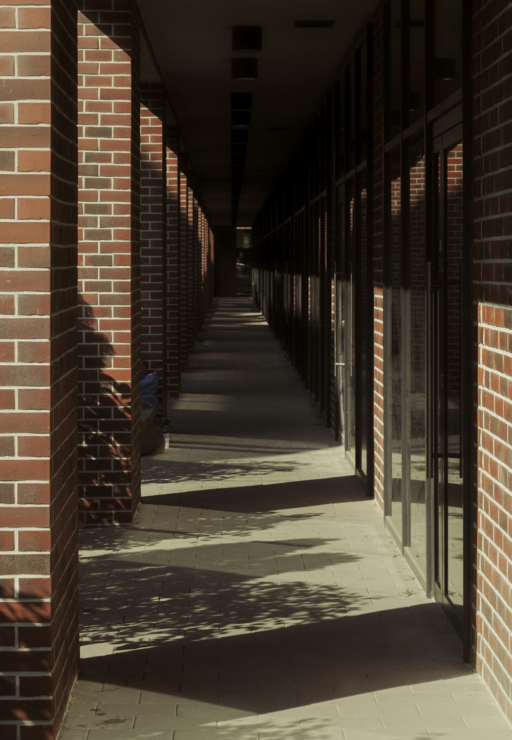 a row of windows on a brick building