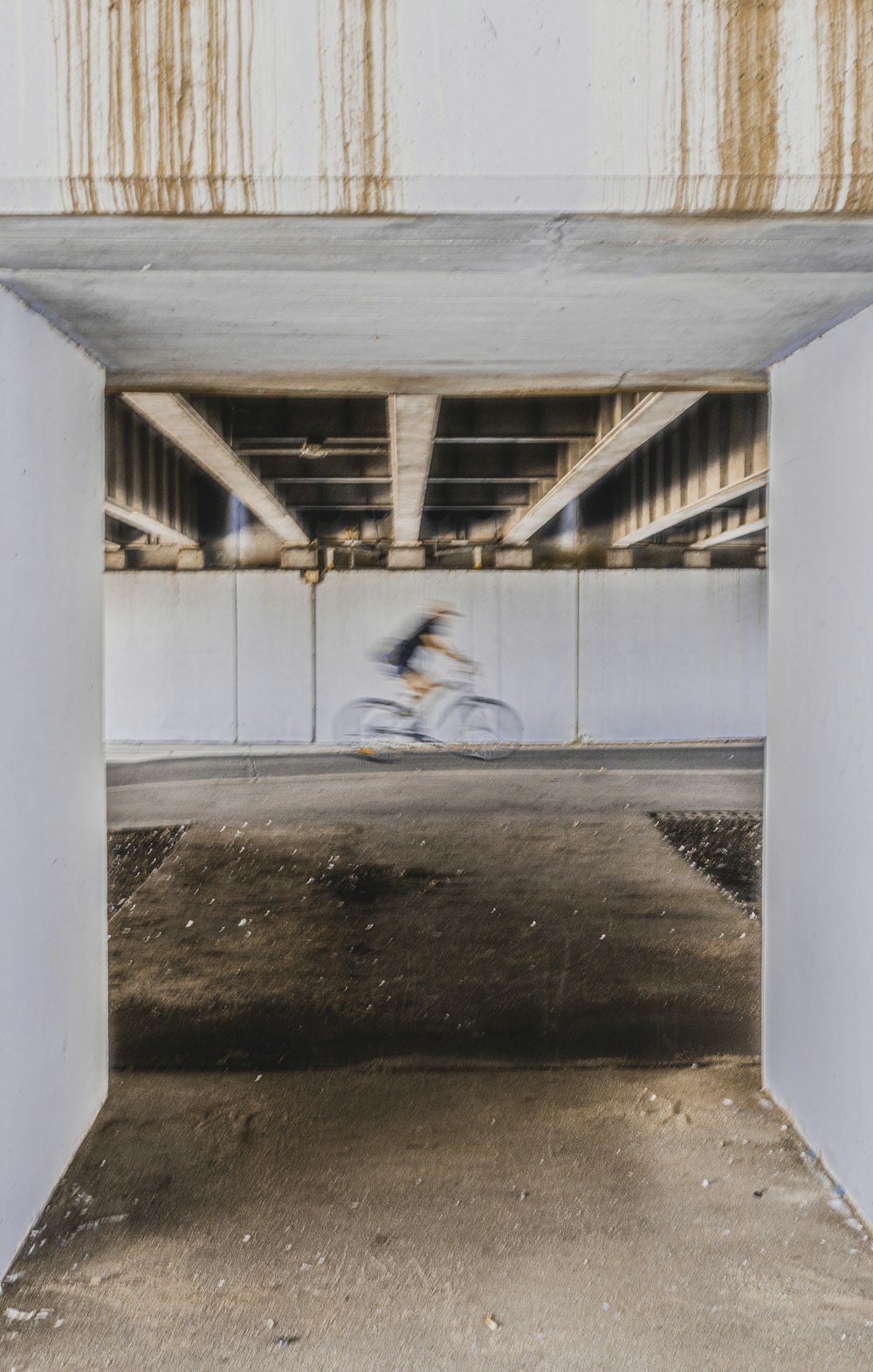 an empty parking garage with graffiti on the walls