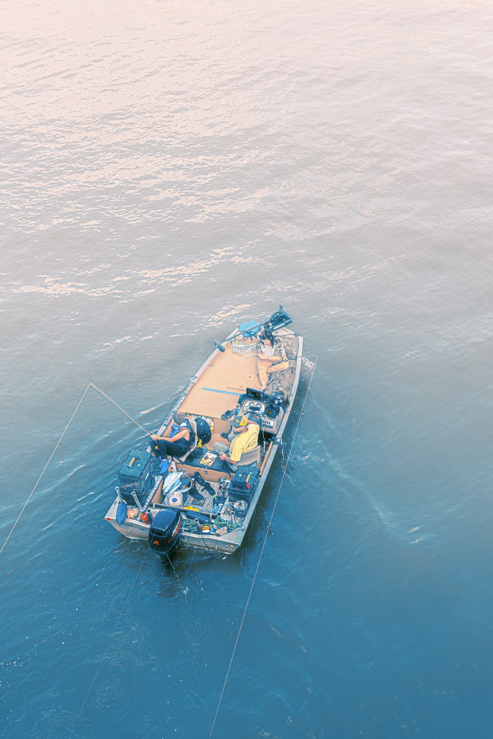 a small boat in the middle of the ocean