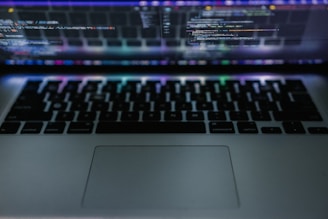 a close up of a laptop with a blurry background