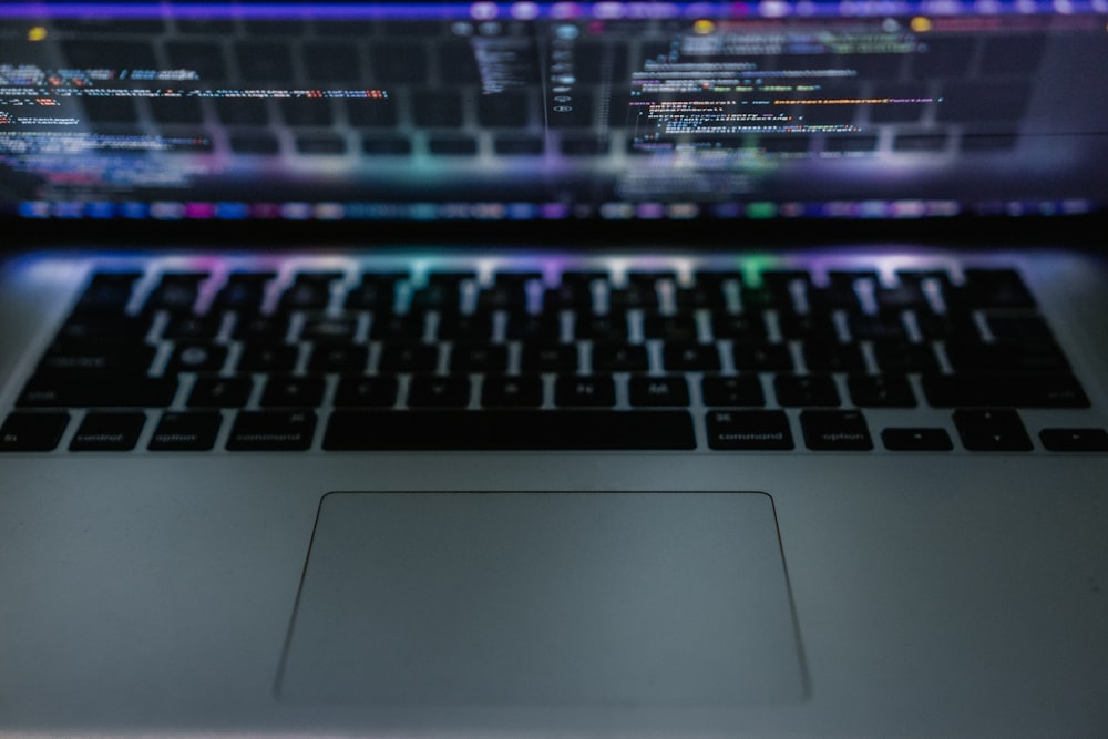 a close up of a laptop with a blurry background