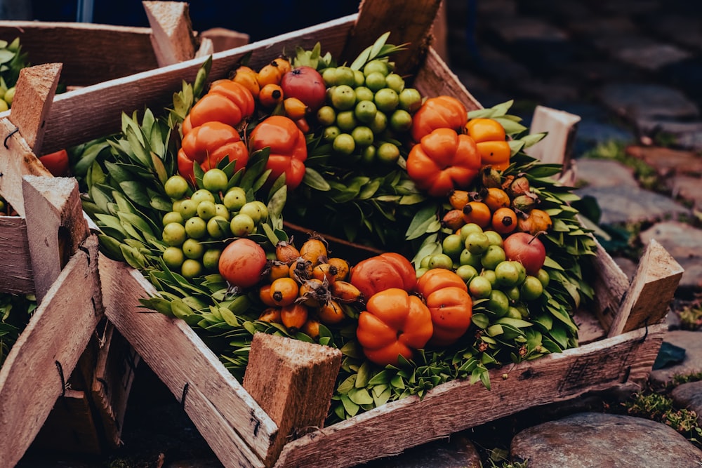 a wooden box filled with lots of fruit