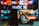 A blurred background displays a colorful television screen with various channels or streaming apps, featuring the Vietnamese word 'Quốc Tế'. In the foreground, a hand holds a smartphone on the left and a pair of wireless earphones in a case on the right, both out of focus.