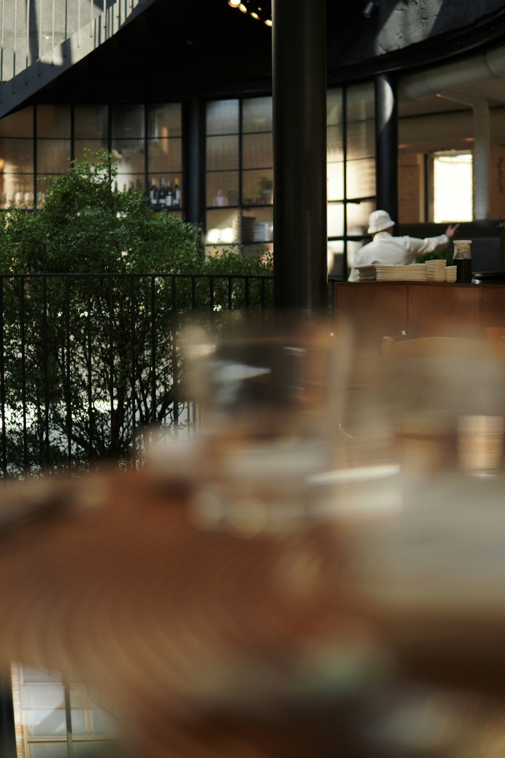 a blurry photo of a table and chairs in a restaurant